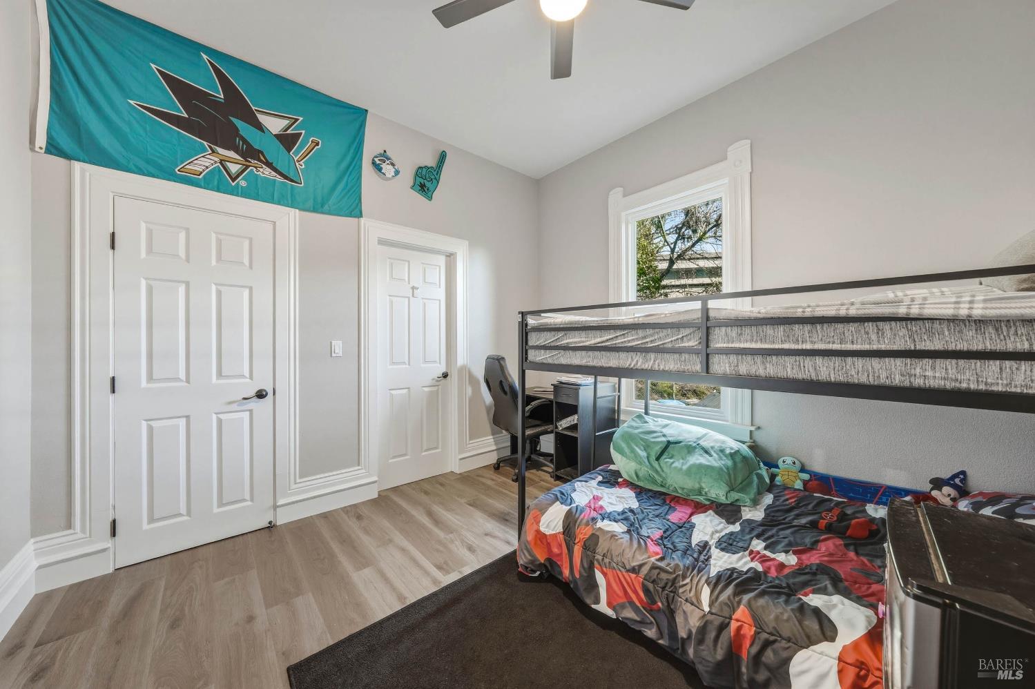 107 Sebastopol Avenue Santa Rosa, CA 95407 - Photo 23 of 33 a bedroom with bed and a window