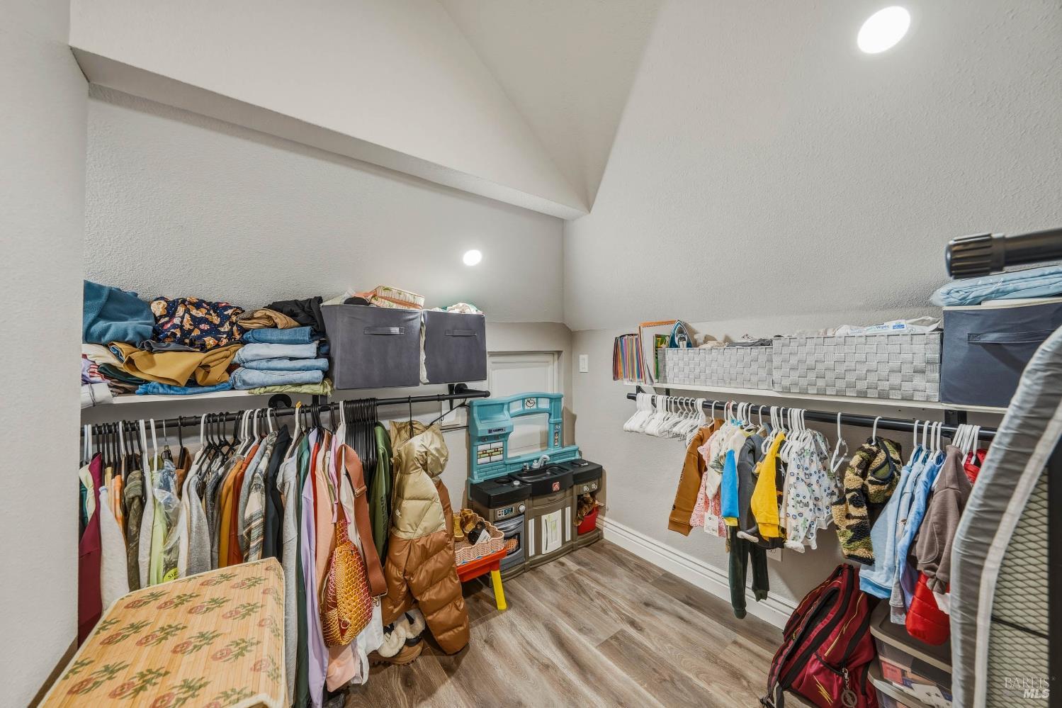 107 Sebastopol Avenue Santa Rosa, CA 95407 - Photo 26 of 33 a view of walk in closet with clothes and shoes