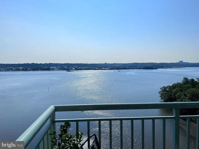 a view of a lake from a balcony
