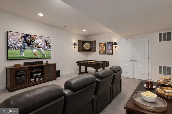 a kitchen with stainless steel appliances and cabinets