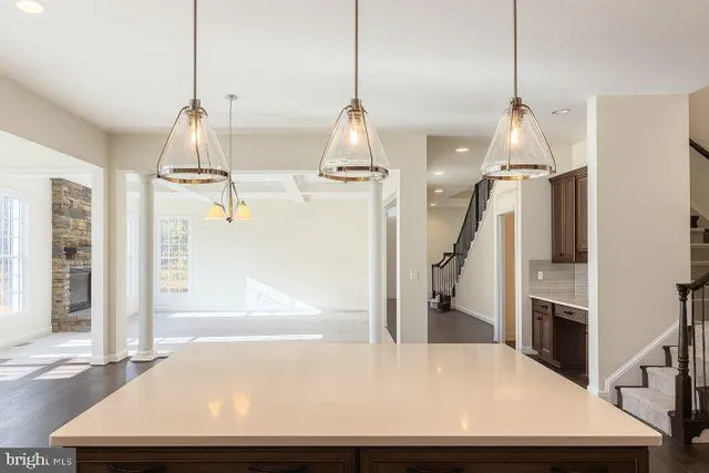 a view of a living room and entryway