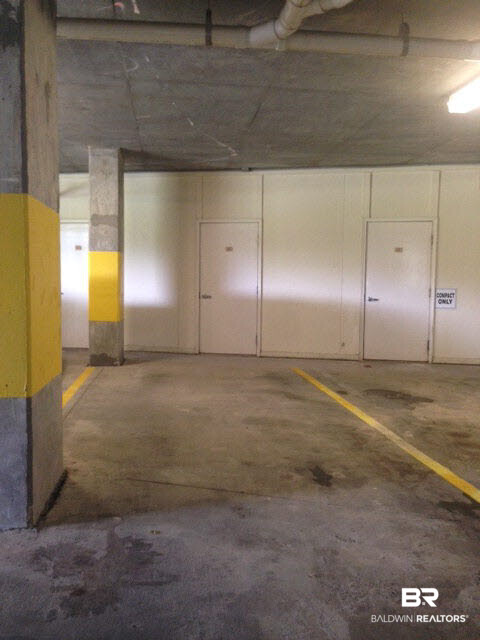 28250 Canal Road, Unit 906 Orange Beach, AL 36561 - Photo 22 of 43 Attached parking garage #17 with storage room