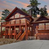 a front view of a house with a garage