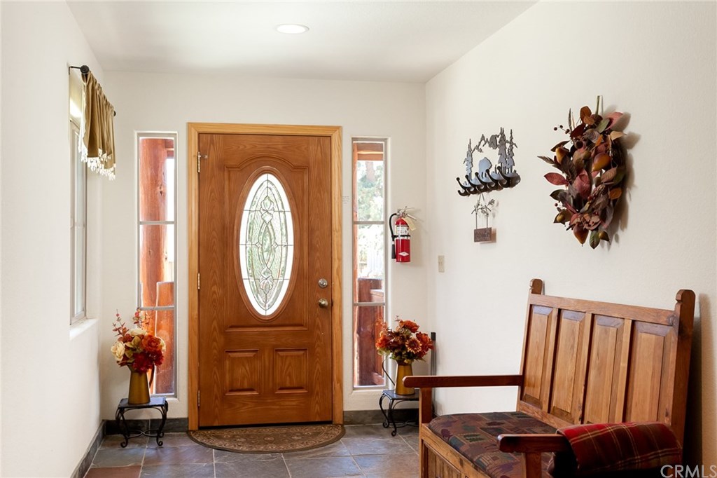 209 Rodeo Road Big Bear City, CA 92314 - Photo 20 of 39 a view of a hallway with a small entryway