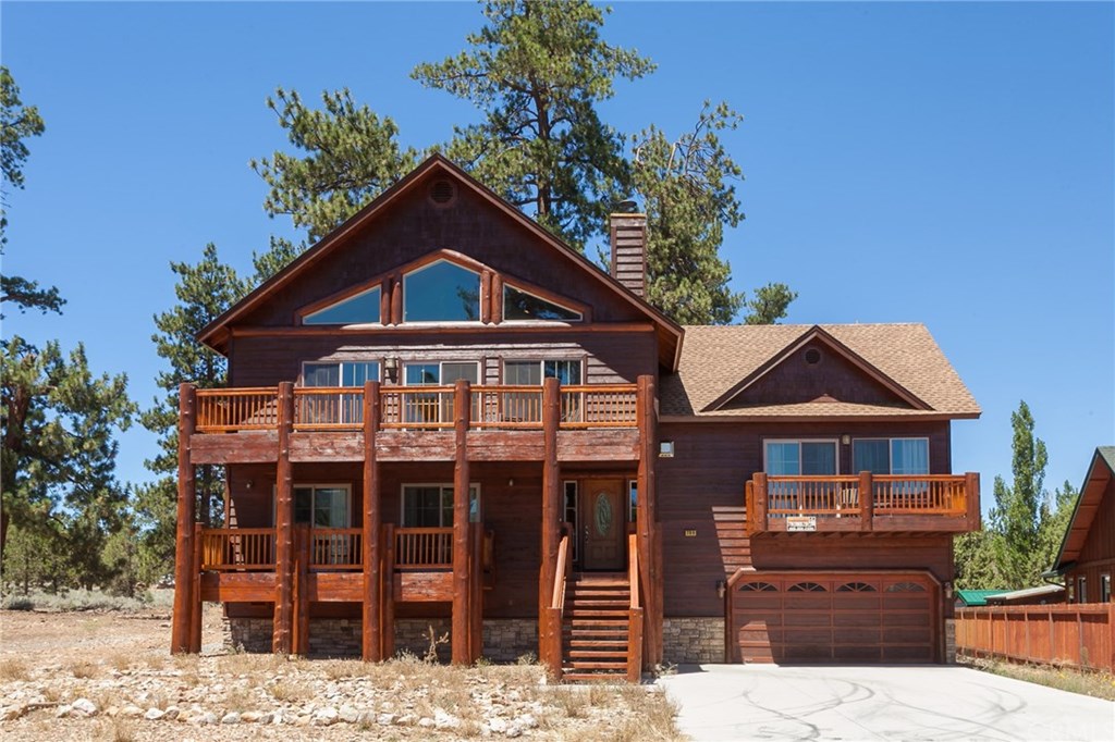 209 Rodeo Road Big Bear City, CA 92314 - Photo 39 of 39 a front view of a house with a yard