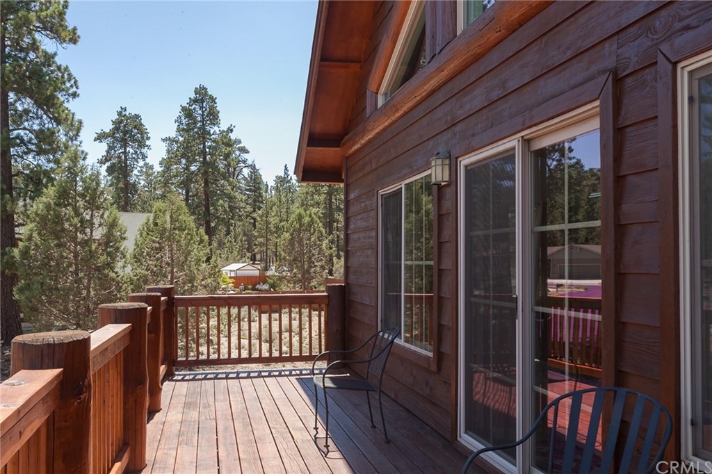 209 Rodeo Road Big Bear City, CA 92314 - Photo 9 of 39 a view of balcony with wooden floor