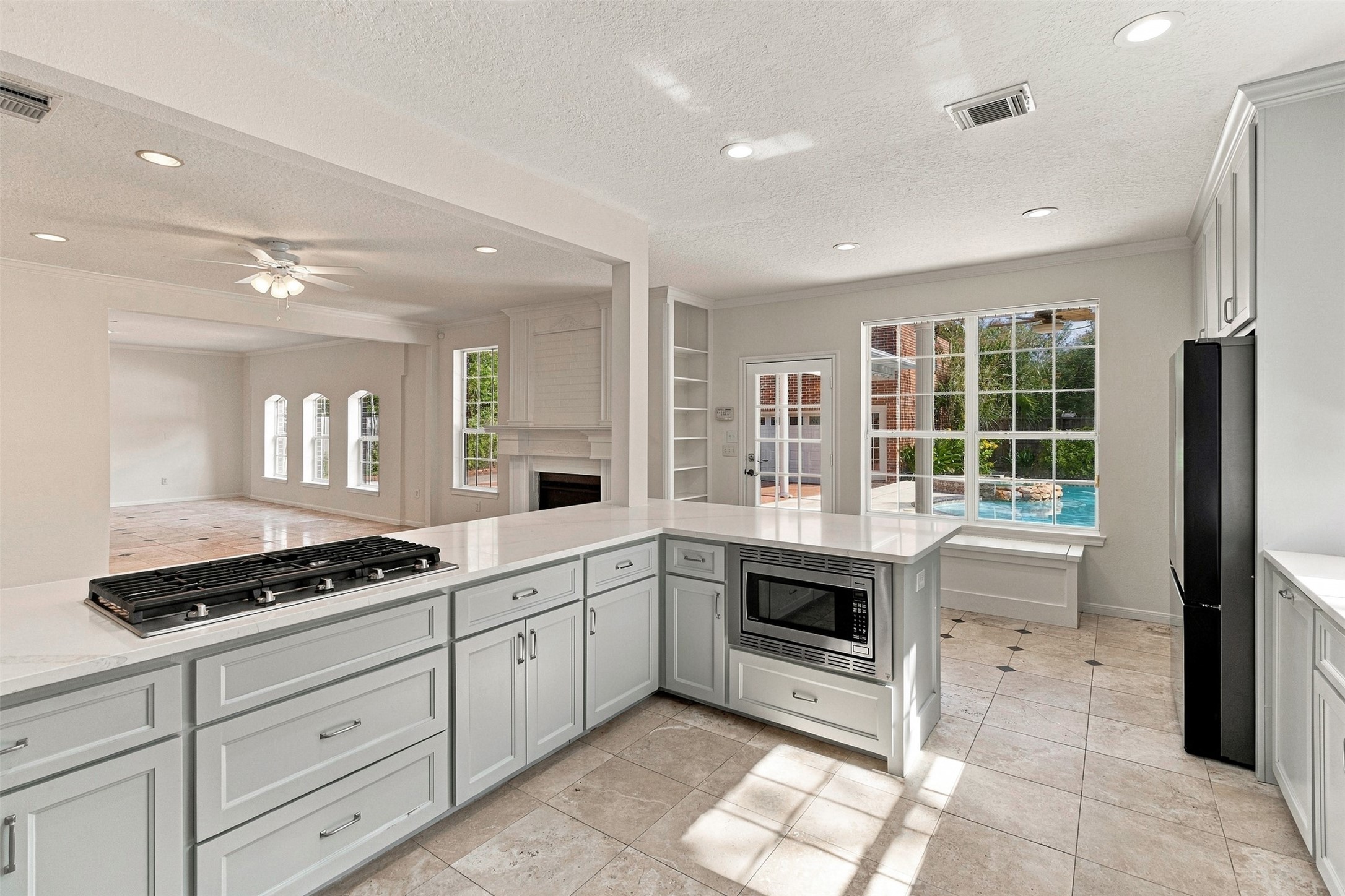 101 Rustic Lane Friendswood, TX 77546 - Photo 12 of 44 Updated custom cabinetry, quartz counters and stainless appliances!