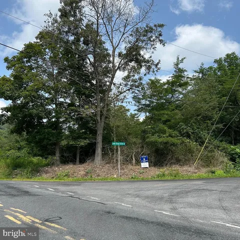 a garden view with a seating space
