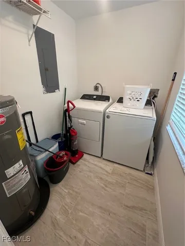 a storage room with washer and dryer