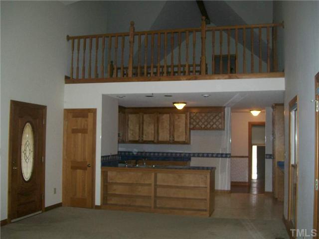 417 Manor Hills Road Lillington, NC 27546 - Photo 3 of 7 Loft and 3 finished rooms on second level
