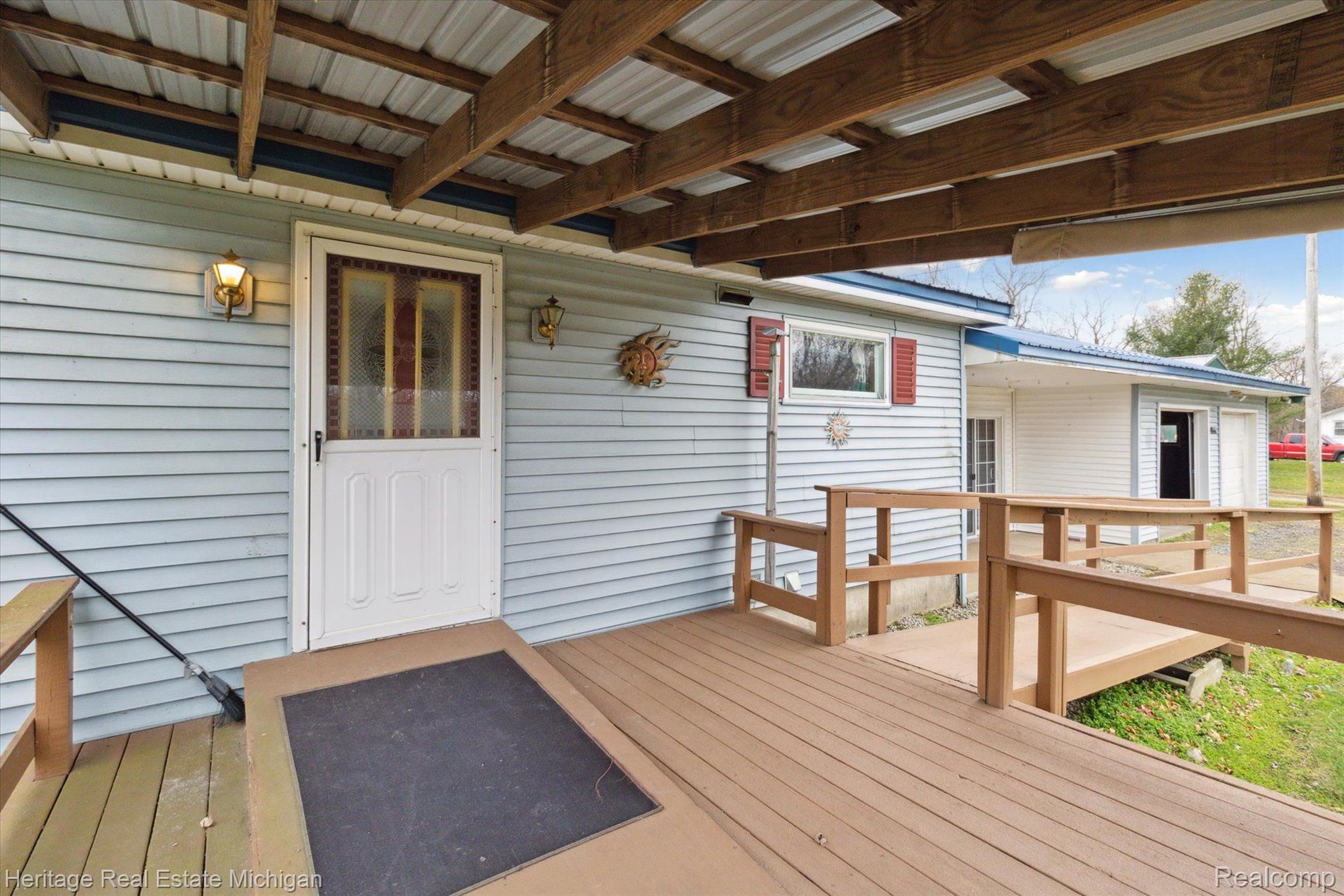 998 Lansing Road Morrice, MI 48857 - Photo 7 of 47 Front Porch