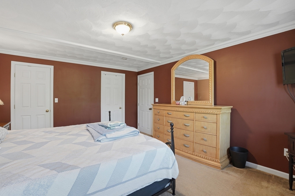 160 Gray Road Templeton, MA 01468 - Photo 25 of 42 a bedroom with a bed and a dresser