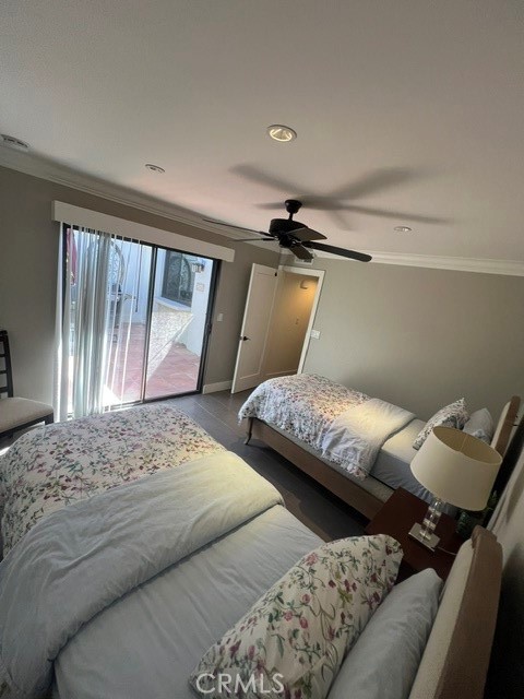 36 El Toro Drive Rancho Mirage, CA 92270 - Photo 20 of 25 a bedroom with a bed and wooden floor