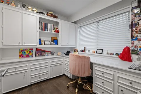 a spacious bathroom with a granite countertop sink mirror and toilet