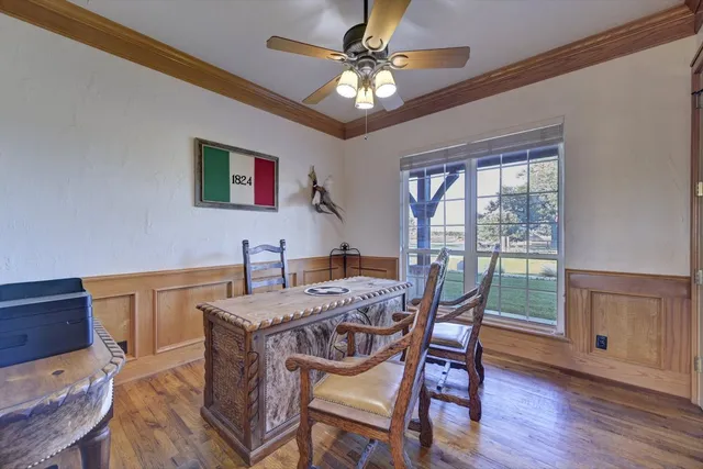 a kitchen with stainless steel appliances granite countertop a sink a stove and cabinets