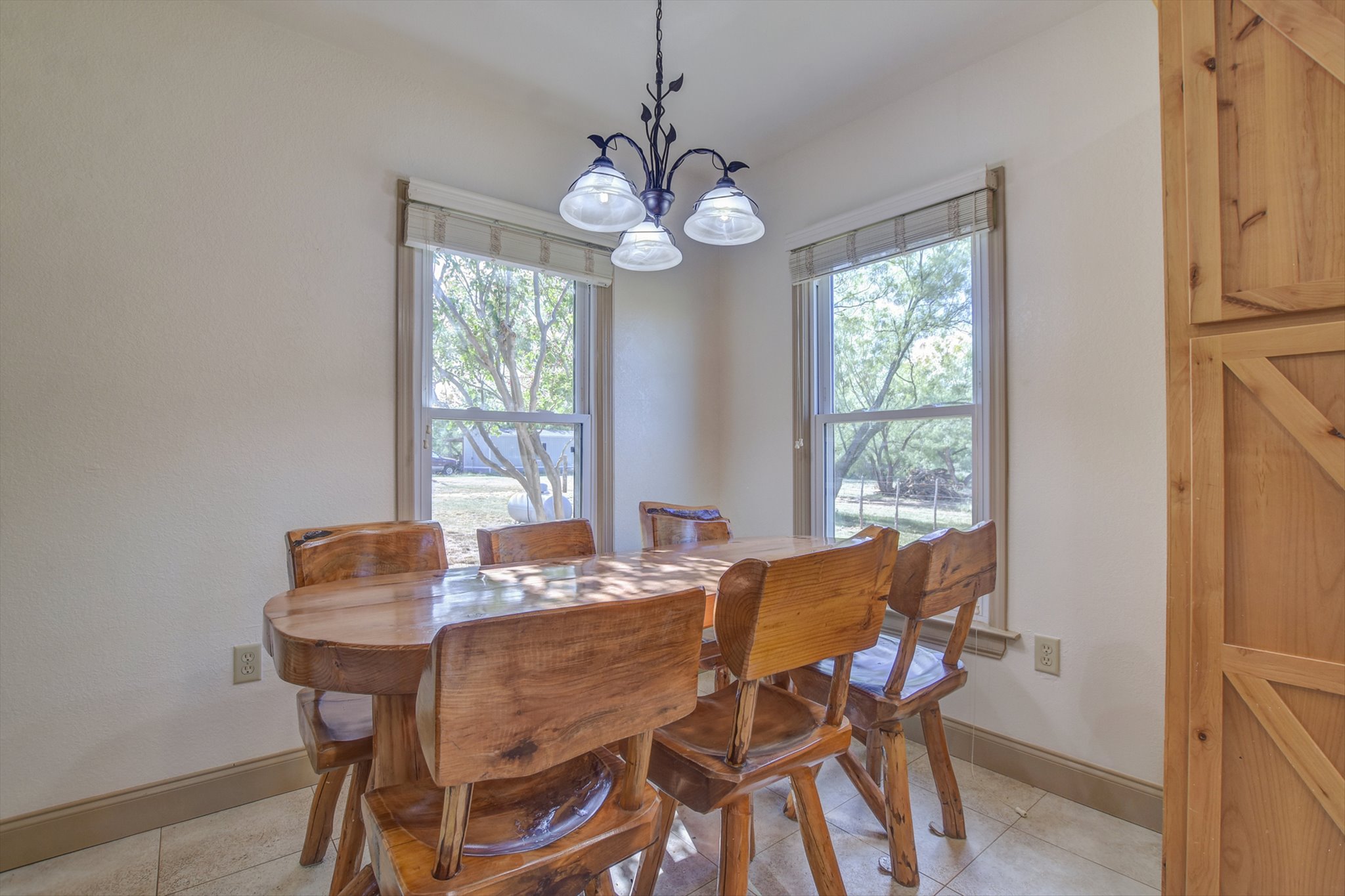 18601 County Road 214 Brookesmith, TX 76827 - Photo 31 of 39 a view of a dining room with furniture window and outside view