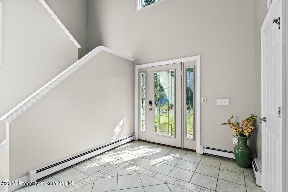 28 Ridgeview Drive Scranton, PA 18504 - Photo 13 of 55 a view of an entryway with wooden floor