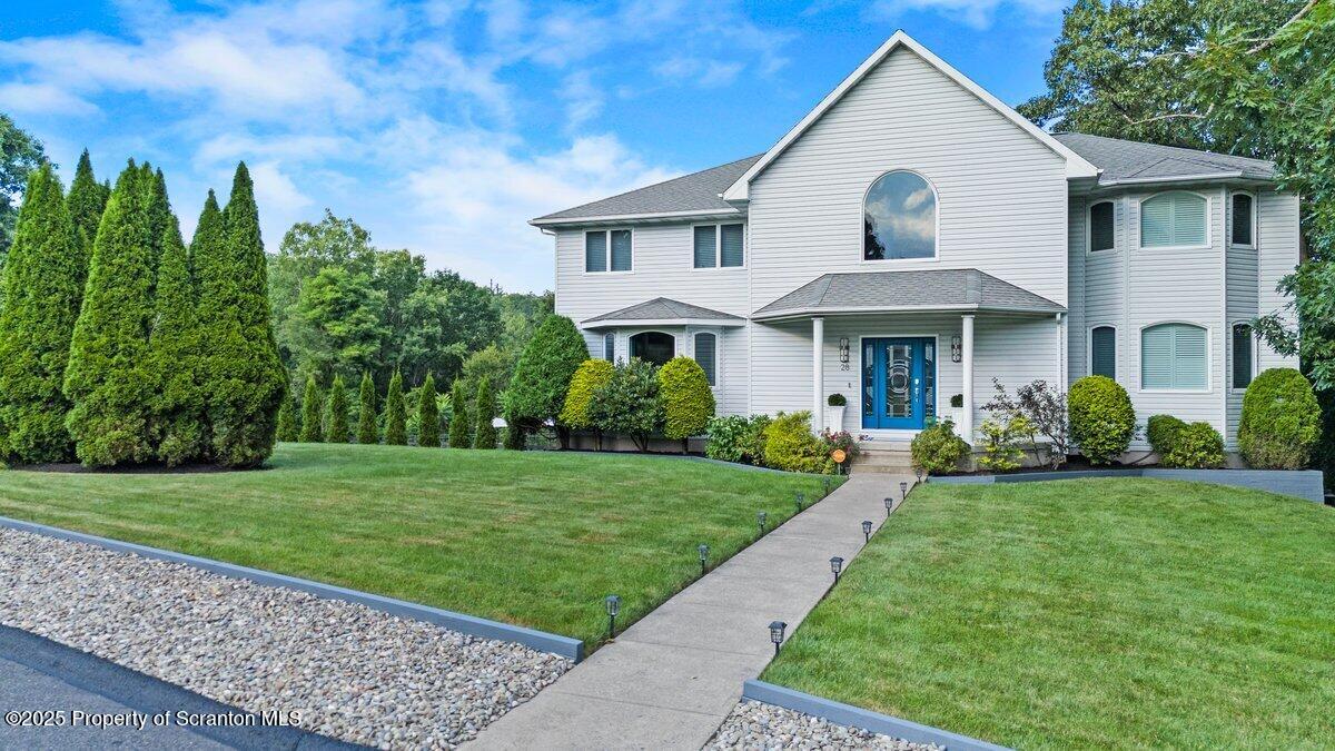 28 Ridgeview Drive Scranton, PA 18504 - Photo 3 of 55 a front view of a house with a yard