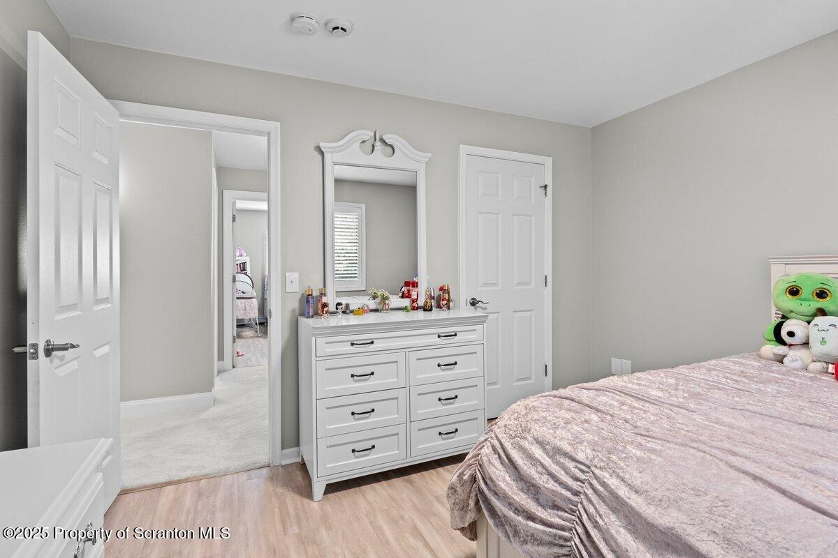 28 Ridgeview Drive Scranton, PA 18504 - Photo 32 of 55 a bedroom with a bed and a dresser