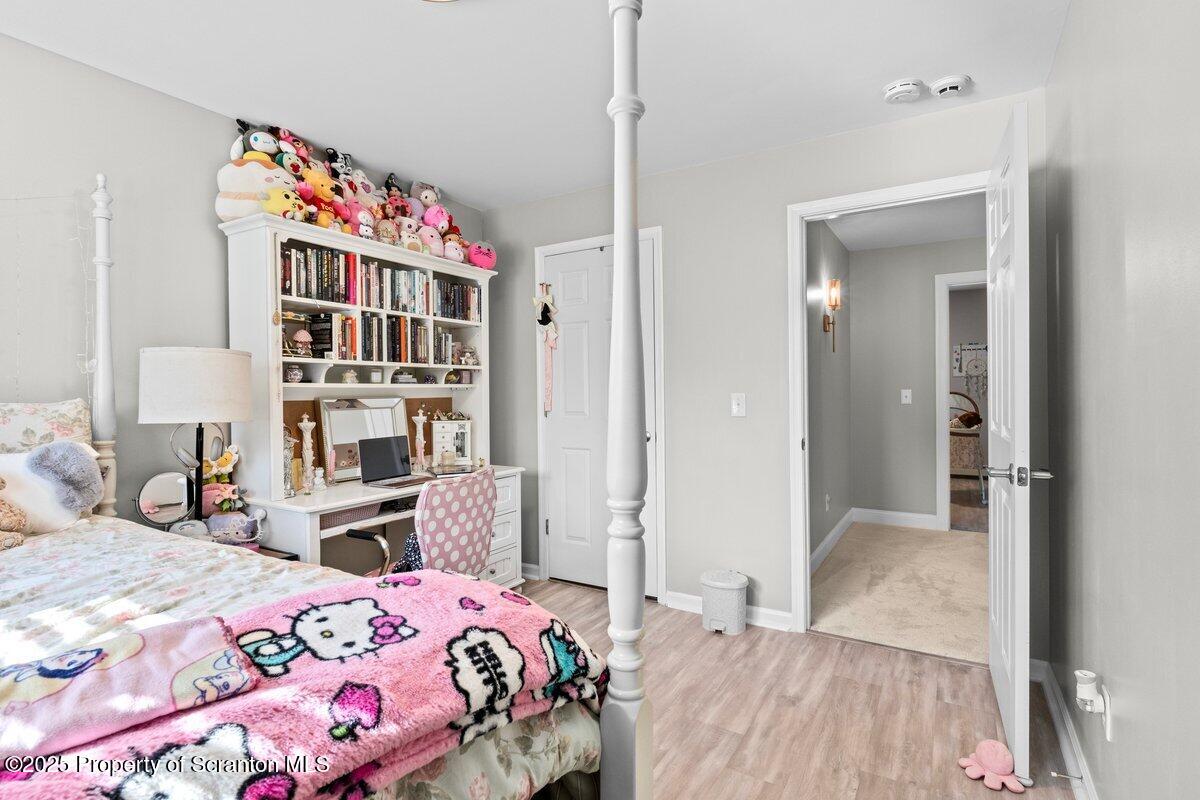 28 Ridgeview Drive Scranton, PA 18504 - Photo 34 of 55 a bedroom with a bed and a closet