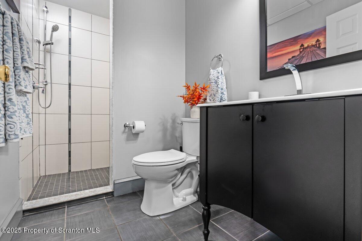 28 Ridgeview Drive Scranton, PA 18504 - Photo 45 of 55 a bathroom with a toilet and a shower