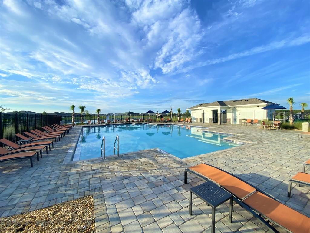 5010 Four Strand Court St. Cloud, FL 34772 - Photo 5 of 34 a view of swimming pool with outdoor seating