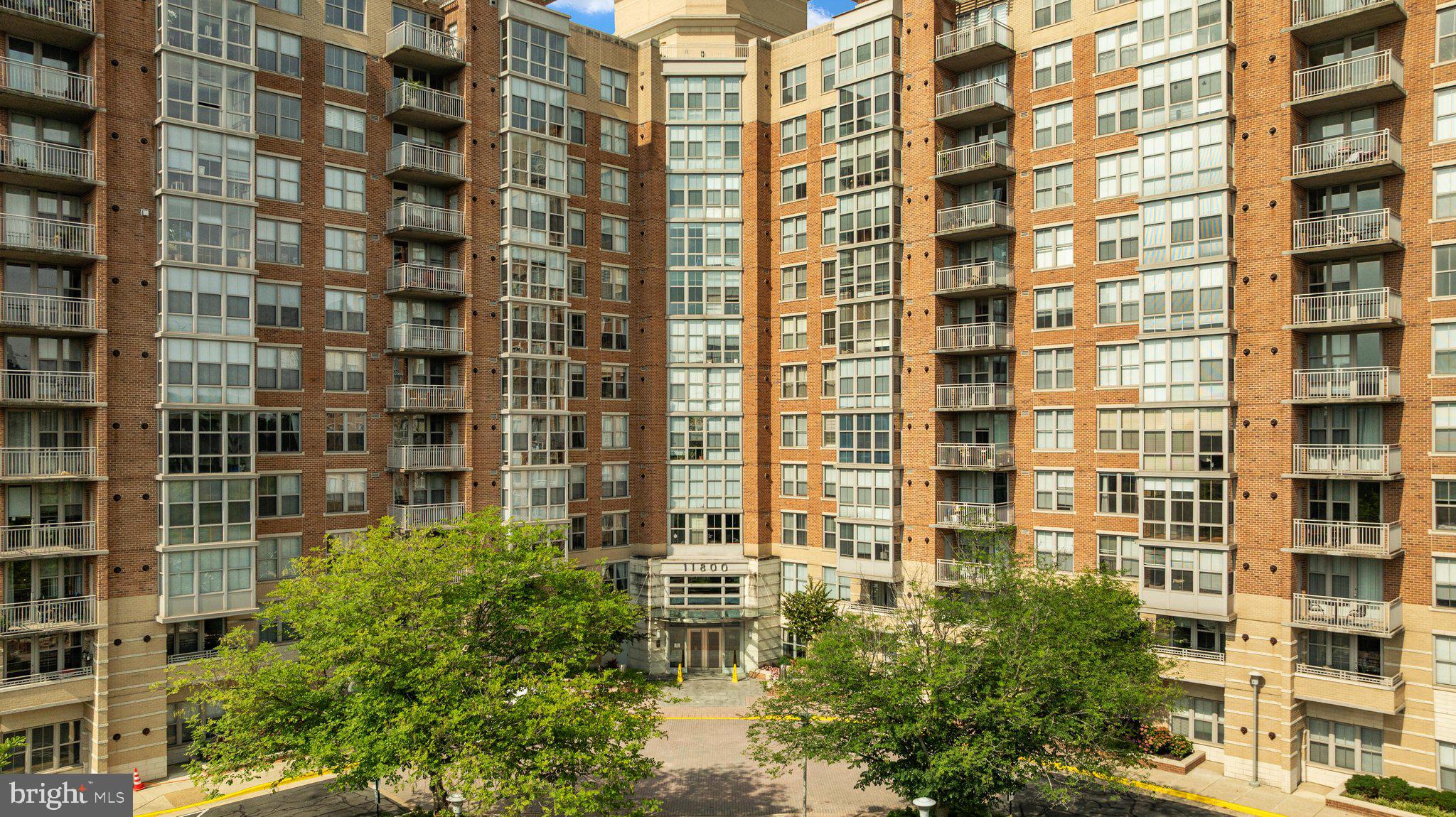 11800 Sunset Hills Road, Unit 815 Reston, VA 20190 - Photo 27 of 61 Well Maintained Grounds and Front Entry Access