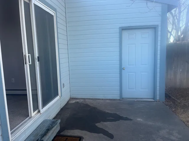 a view of backyard with green space