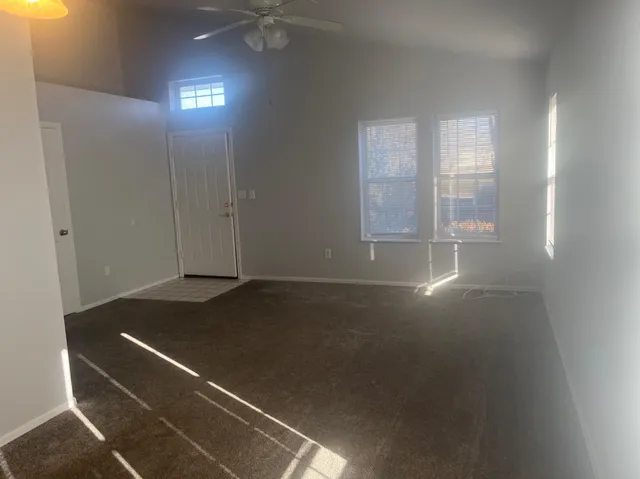 an empty room with windows