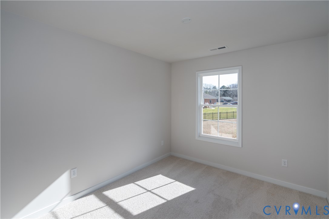 11219 Sparwood Road Chester, VA 23831 - Photo 12 of 28 an empty room with windows