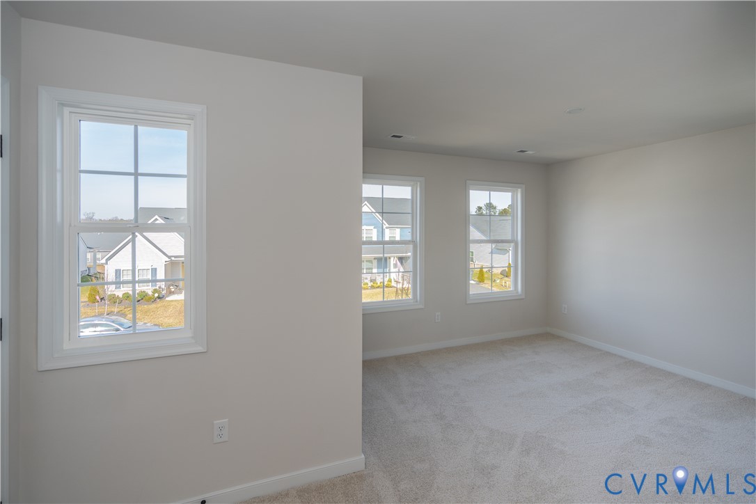 11219 Sparwood Road Chester, VA 23831 - Photo 16 of 28 an empty room with windows