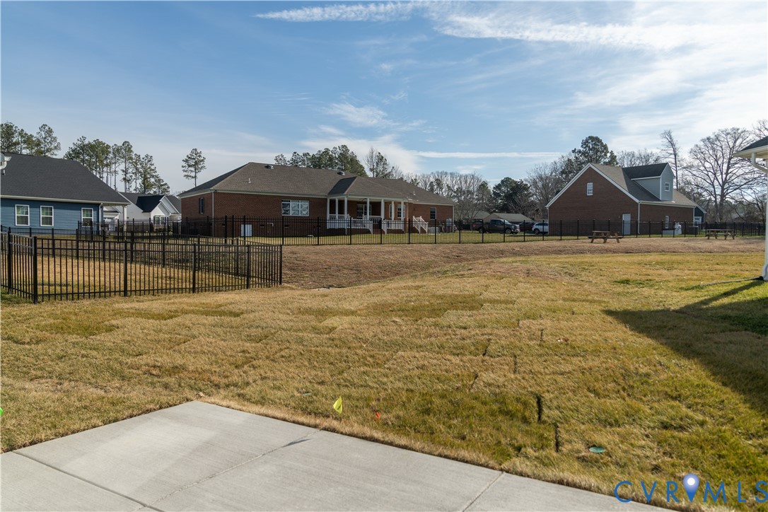 11219 Sparwood Road Chester, VA 23831 - Photo 28 of 28 a front view of a house with a yard