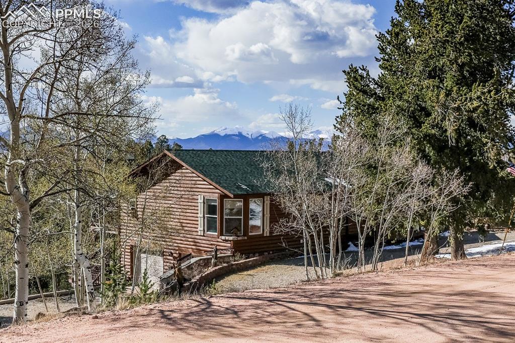 7260 Remington Road Como, CO 80432 - Photo 1 of 46 a view of a house with a yard