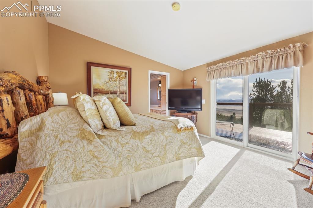 7260 Remington Road Como, CO 80432 - Photo 19 of 46 a bed sitting in a spacious bedroom next to a window