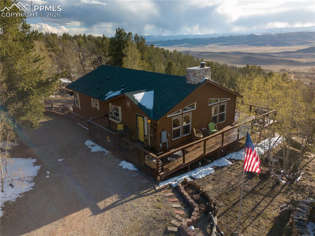 7260 Remington Road Como, CO 80432 - Photo 3 of 46 a aerial view of a house with a yard
