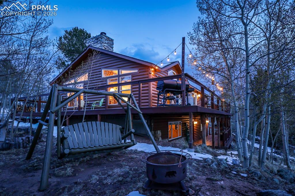 7260 Remington Road Como, CO 80432 - Photo 35 of 46 a front view of a house with garden