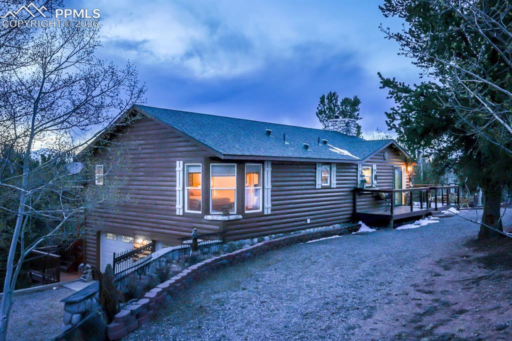 7260 Remington Road Como, CO 80432 - Photo 9 of 46 a view of a house with a yard