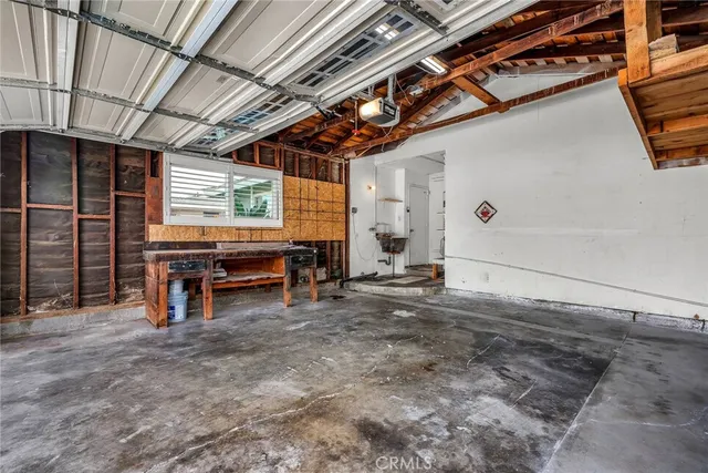 a view of a room with wooden walls