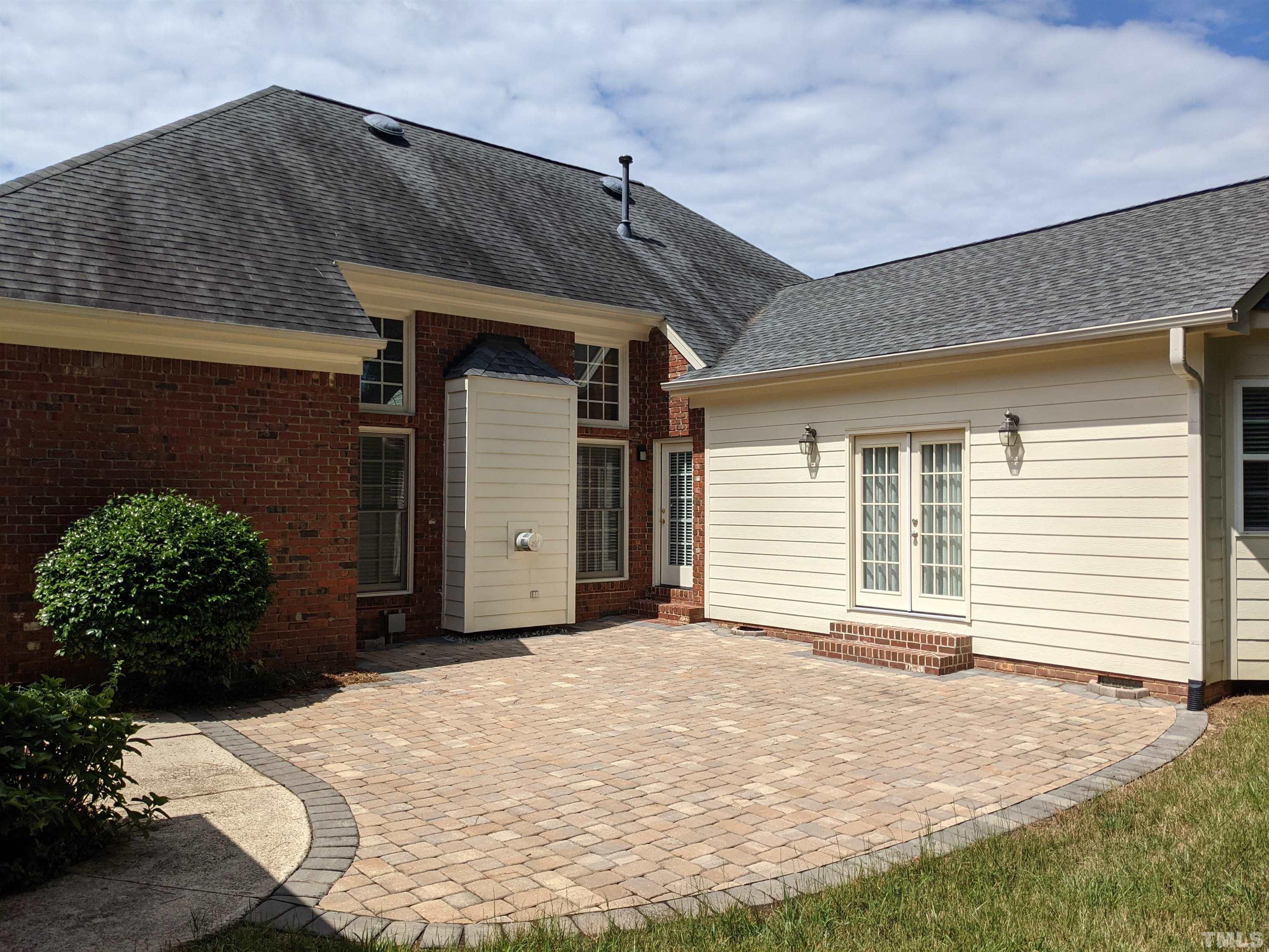 900 Tanworth Drive Raleigh, NC 27615 - Photo 24 of 26 a front view of a house with a yard