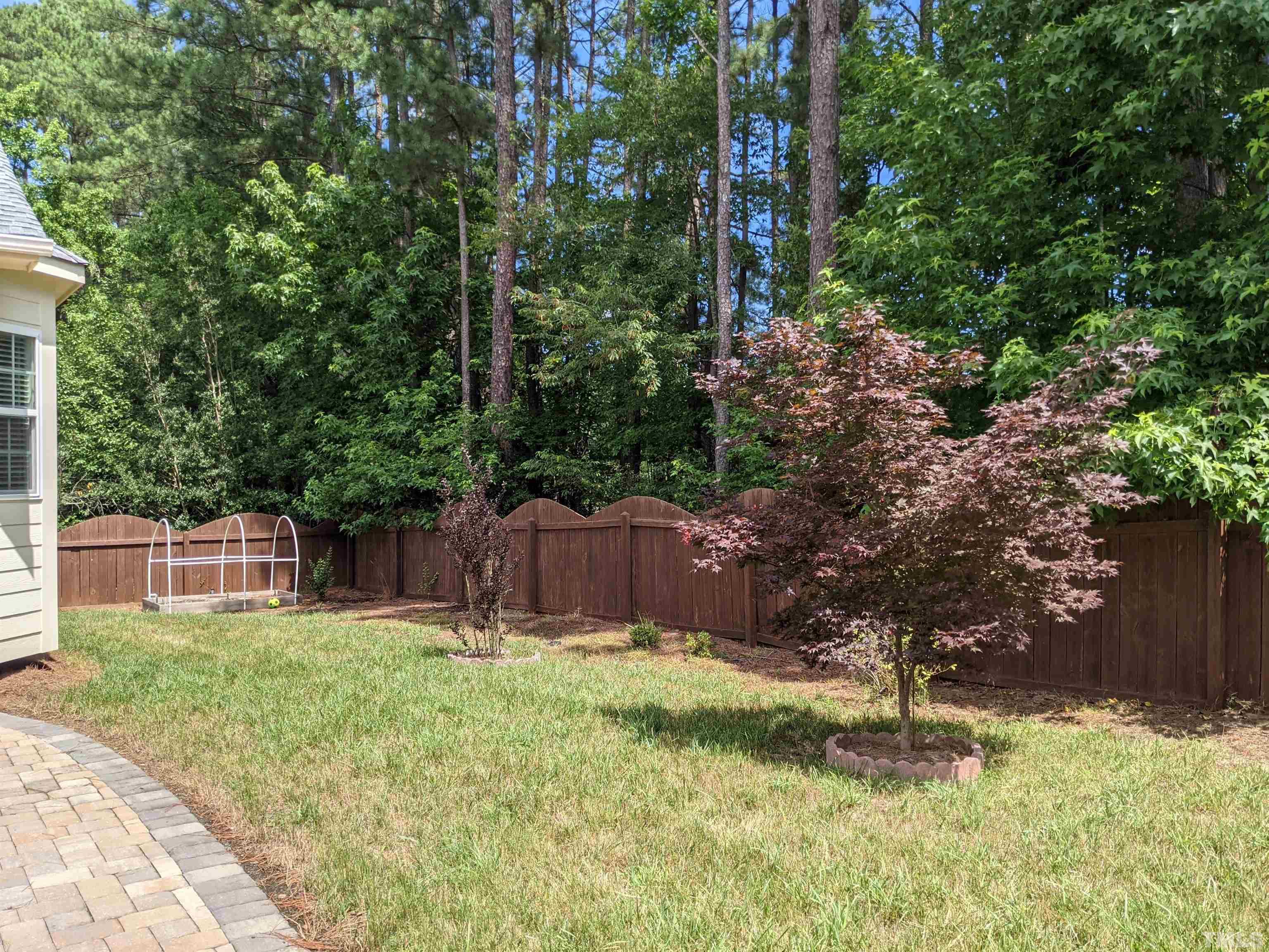900 Tanworth Drive Raleigh, NC 27615 - Photo 26 of 26 a view of a backyard with a small cabin