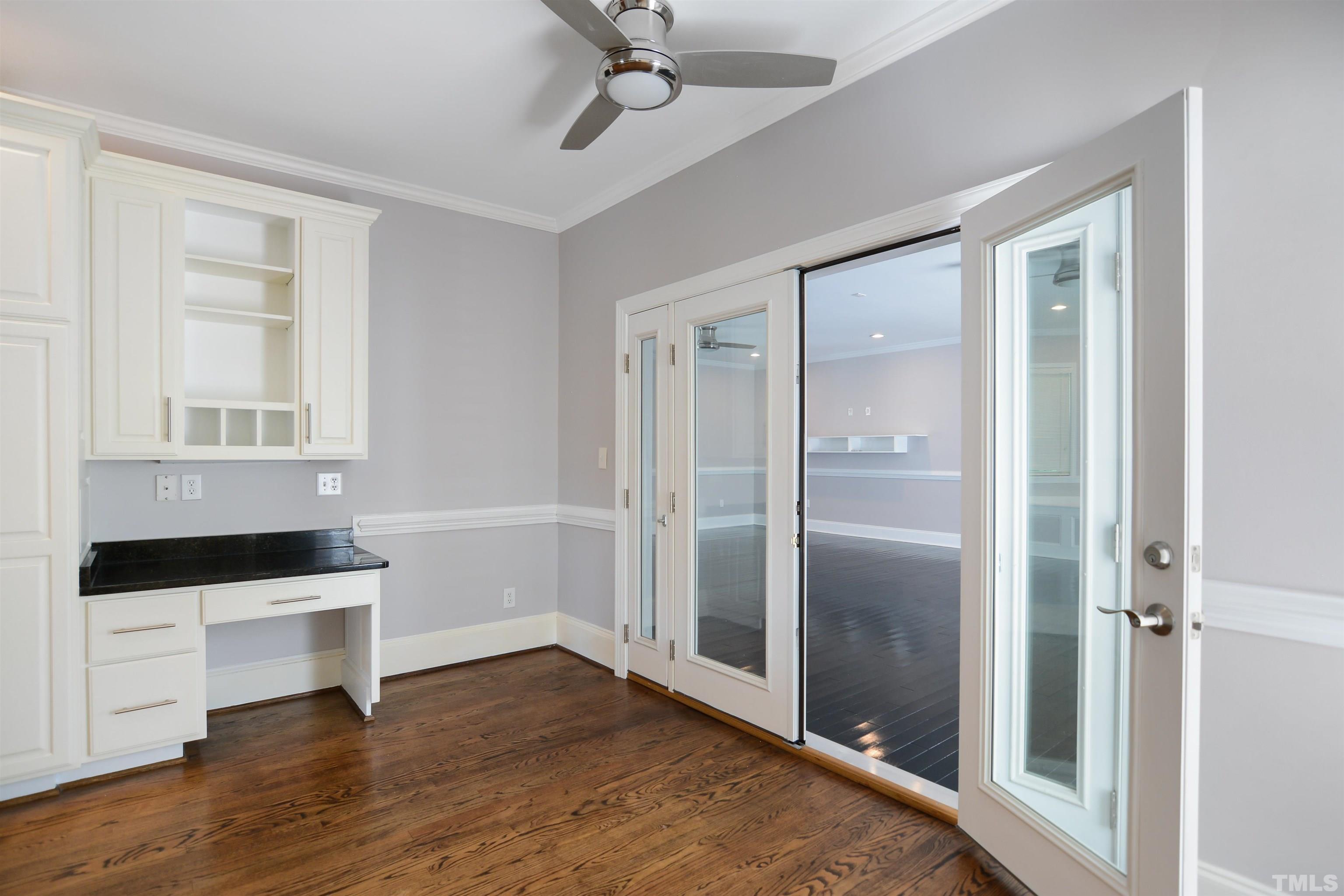 900 Tanworth Drive Raleigh, NC 27615 - Photo 9 of 26 a room that has a window and furniture