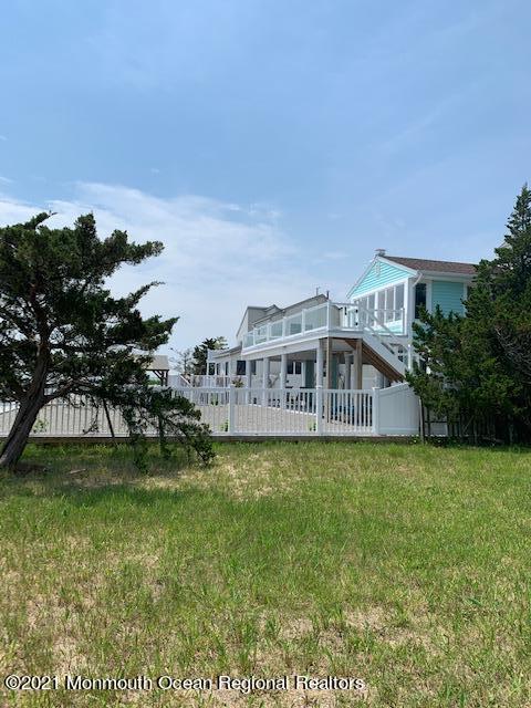 10 Point Road Waretown, NJ 08758 - Photo 13 of 14 a view of a house with a yard
