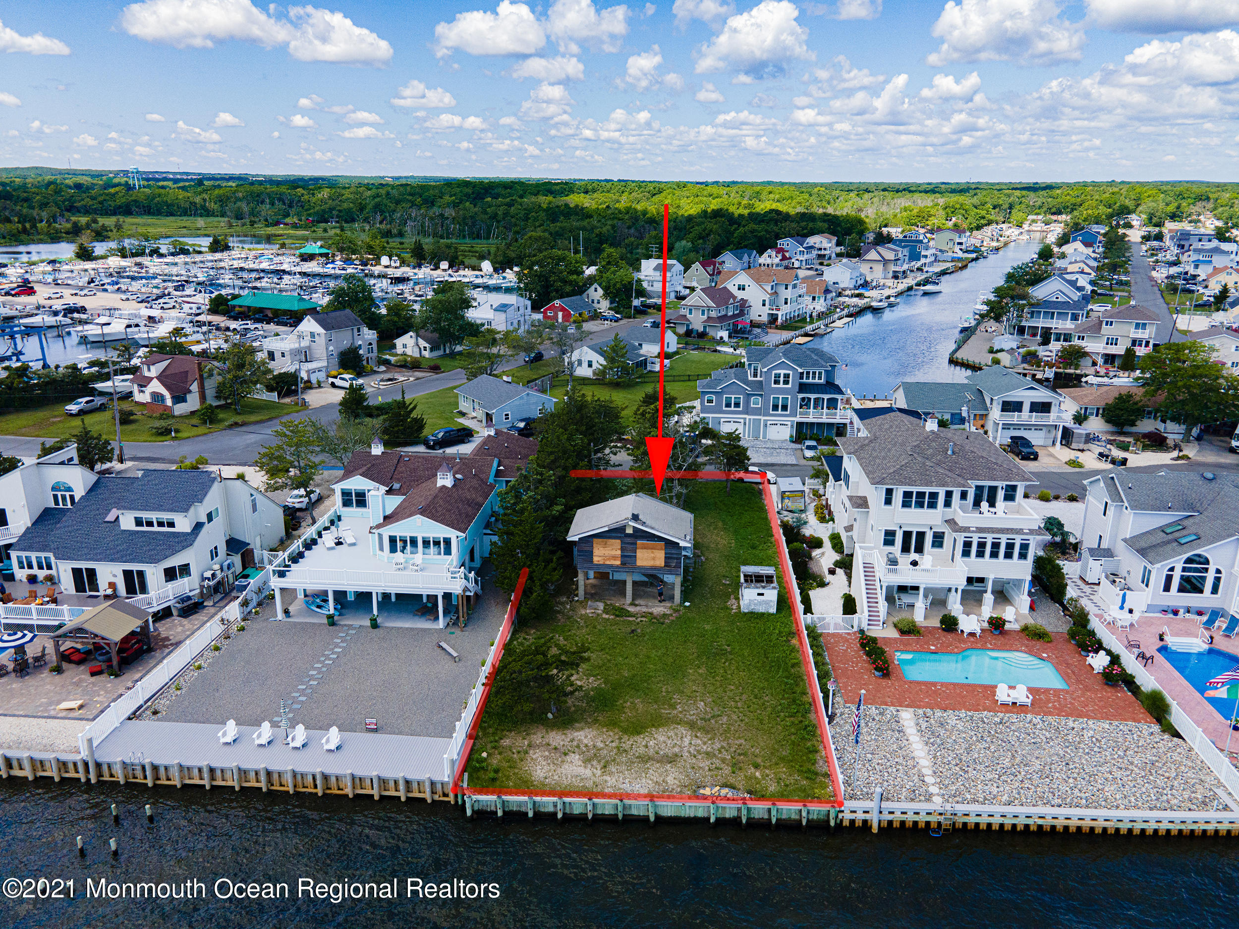 10 Point Road Waretown, NJ 08758 - Photo 7 of 14 a view of swimming pool in front of residential houses with outdoor space