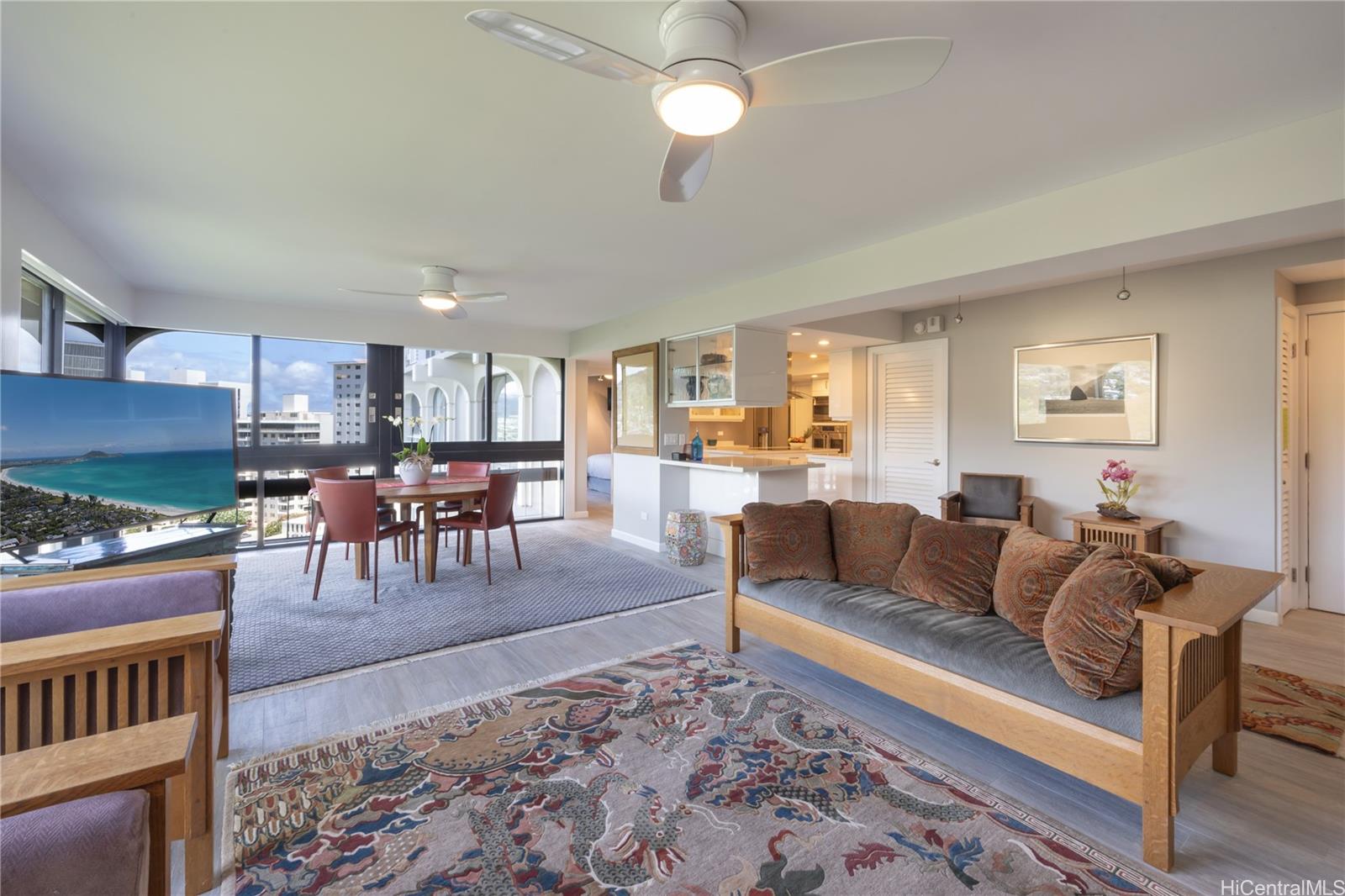 1022 Prospect Street, Unit 903E Honolulu, HI 96813 - Photo 1 of 25 a living room with furniture dining area and a fireplace
