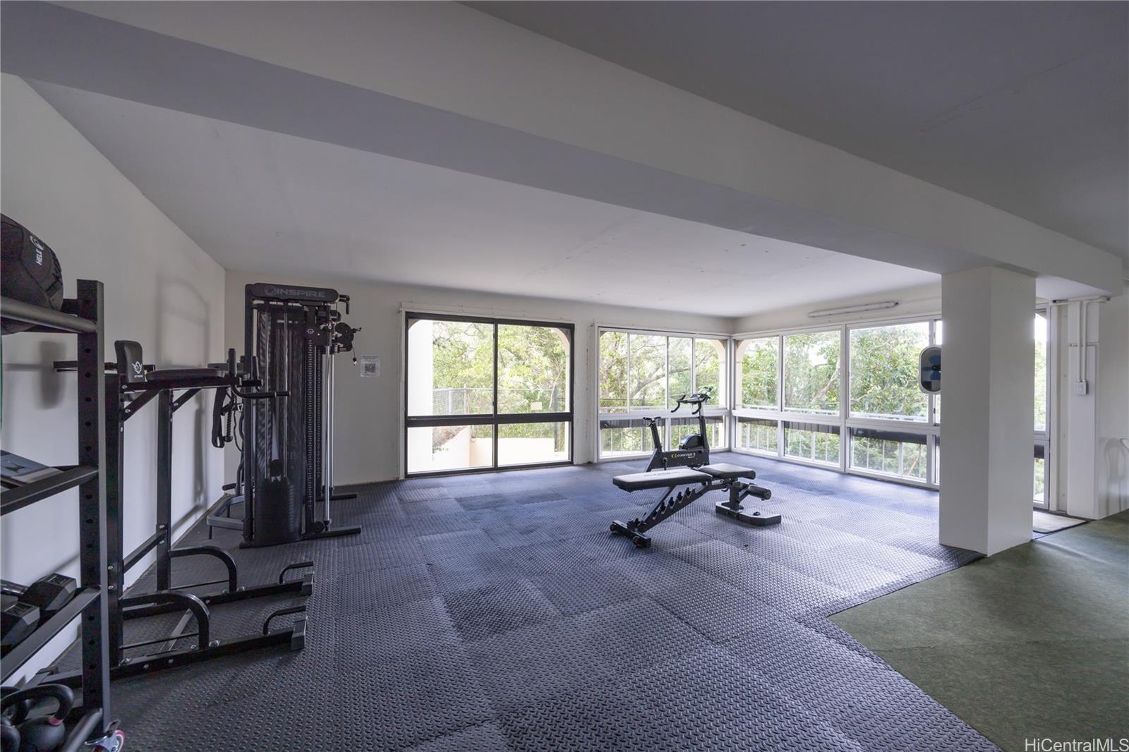 1022 Prospect Street, Unit 903E Honolulu, HI 96813 - Photo 24 of 25 a living room with furniture and large windows