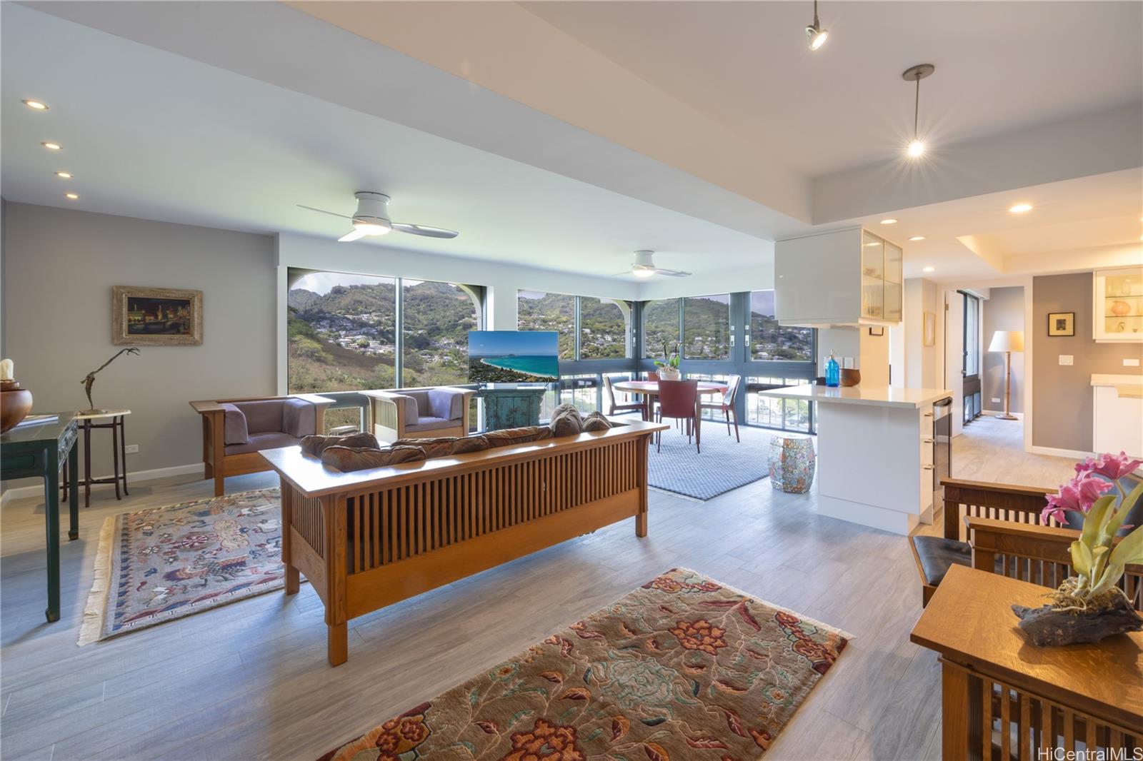 1022 Prospect Street, Unit 903E Honolulu, HI 96813 - Photo 4 of 25 a living room with furniture and a wooden floor