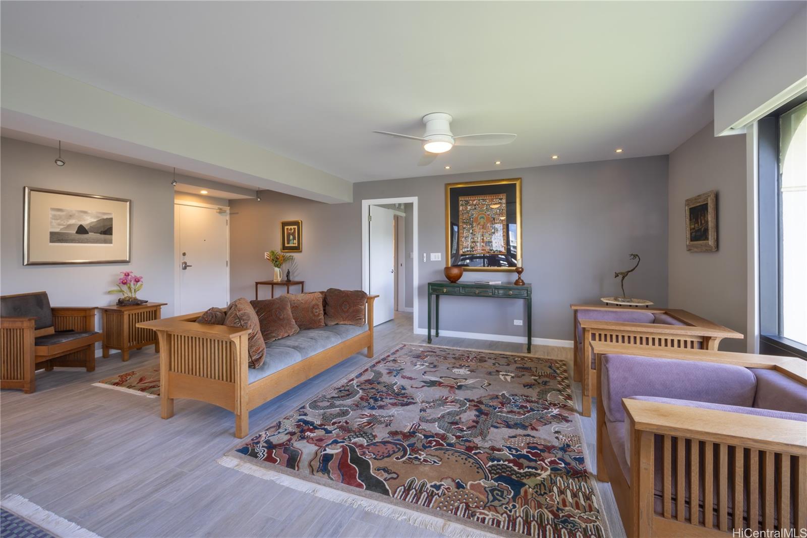 1022 Prospect Street, Unit 903E Honolulu, HI 96813 - Photo 5 of 25 a living room with furniture and a rug