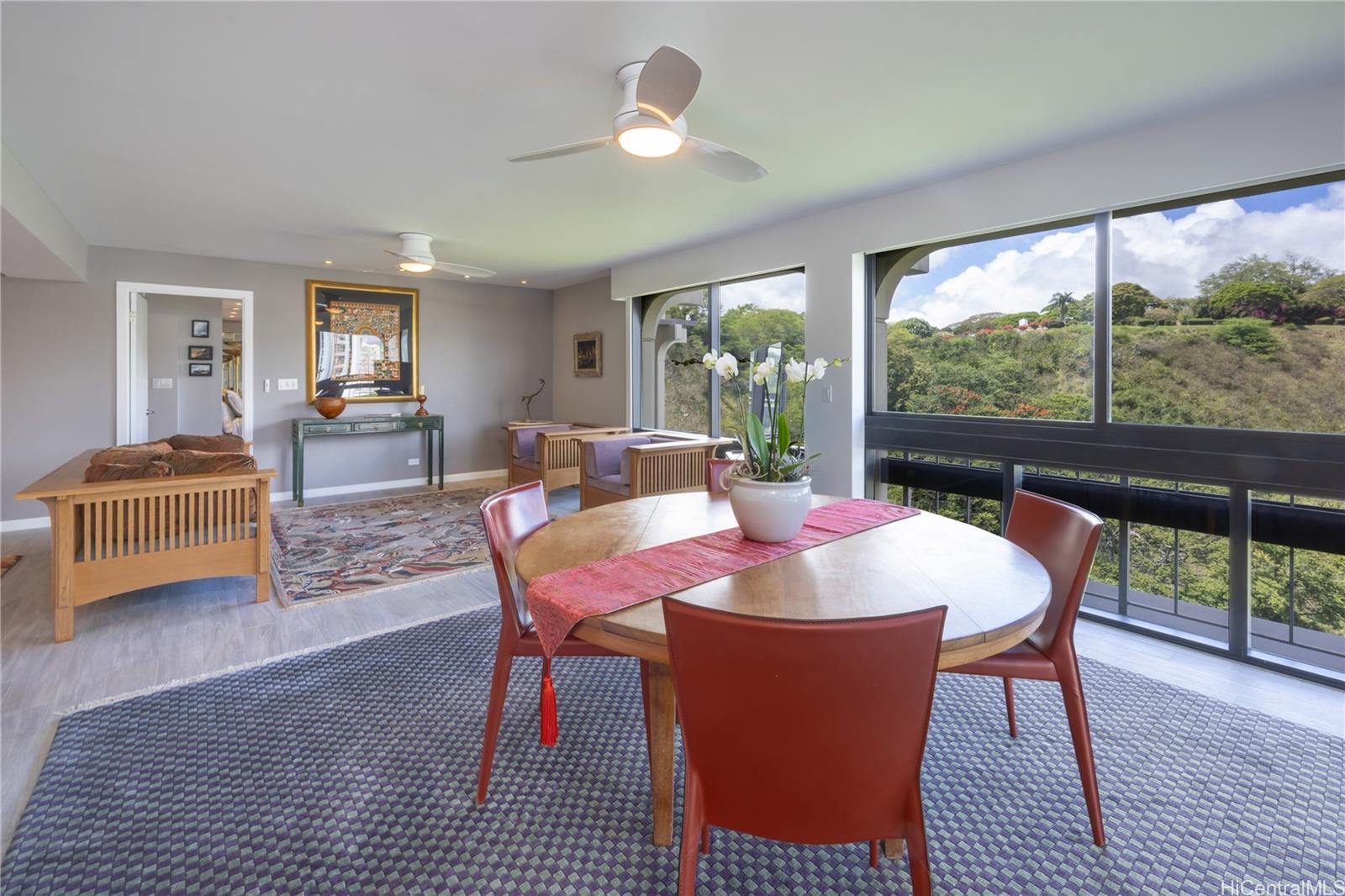 1022 Prospect Street, Unit 903E Honolulu, HI 96813 - Photo 6 of 25 a view of a dining room with furniture window and wooden floor