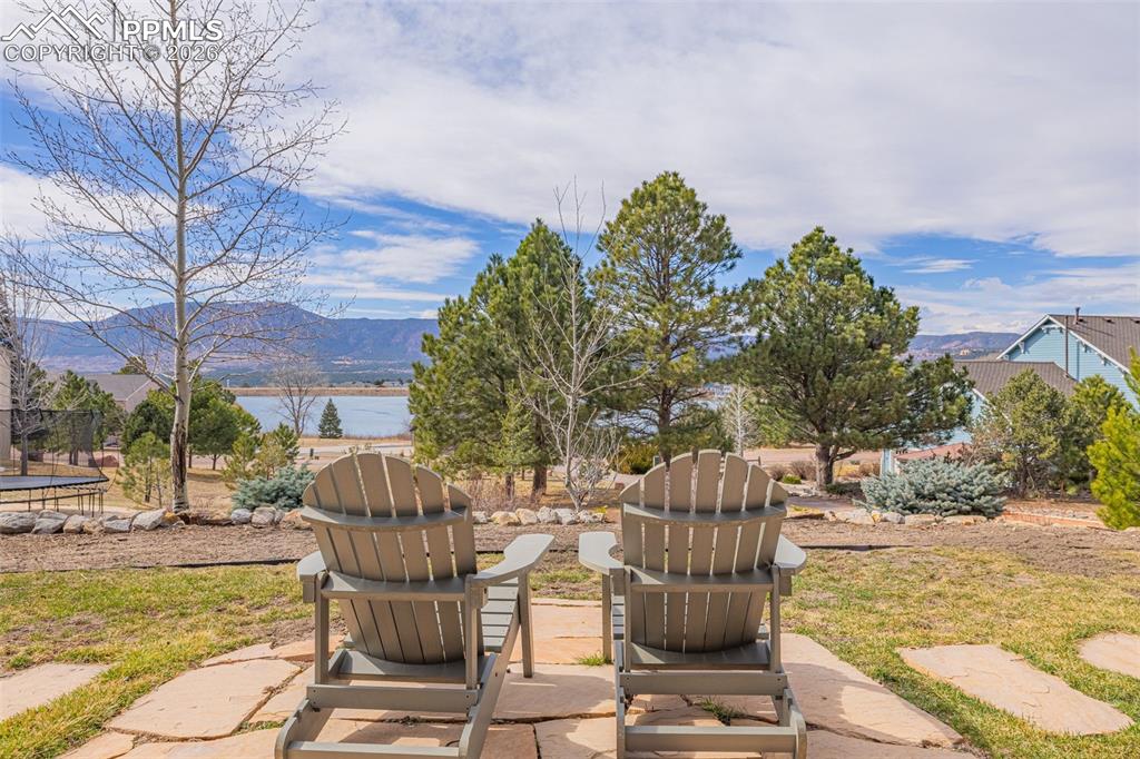 18475 Lower Lake Road Monument, CO 80132 - Photo 5 of 50 a view of a swimming pool with a patio
