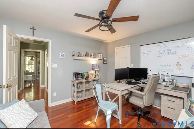 a workspace with furniture and window